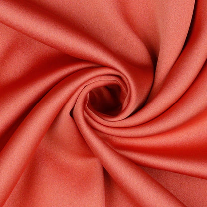 Tissu en soie artificielle rose corail 140 g/m²