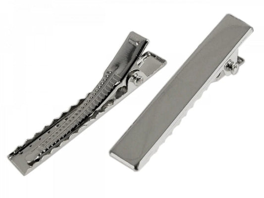 Attēls ar Metāla “alligator” matu sprādze – 40 mm|5 gab – pieejams Šarlotes audumi