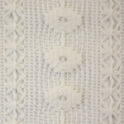 Image of lace fabric, warm white with a floral pattern – available online at Charlotte's Fabrics