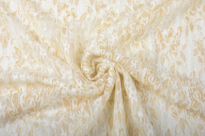 Tissu en dentelle fin avec doré - noir 90 g/m²