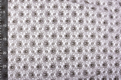 Attēls ar Mežģīņu audums smalks - šokolādes brūni ziedi 75 g/m² – pieejams Šarlotes audumi
