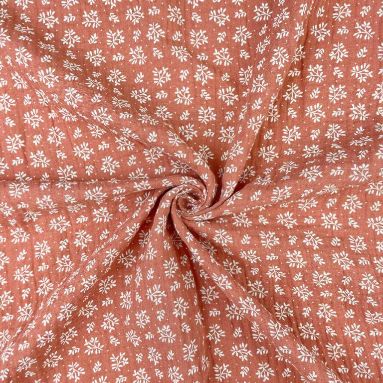 txt
Mousseline - fleurs blanches sur fond orange 130 g/m²