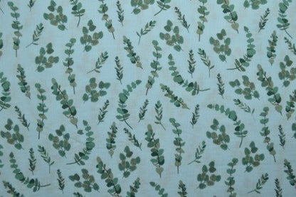 Mousseline - eucalyptus sur fond bleu 140 g/m²
