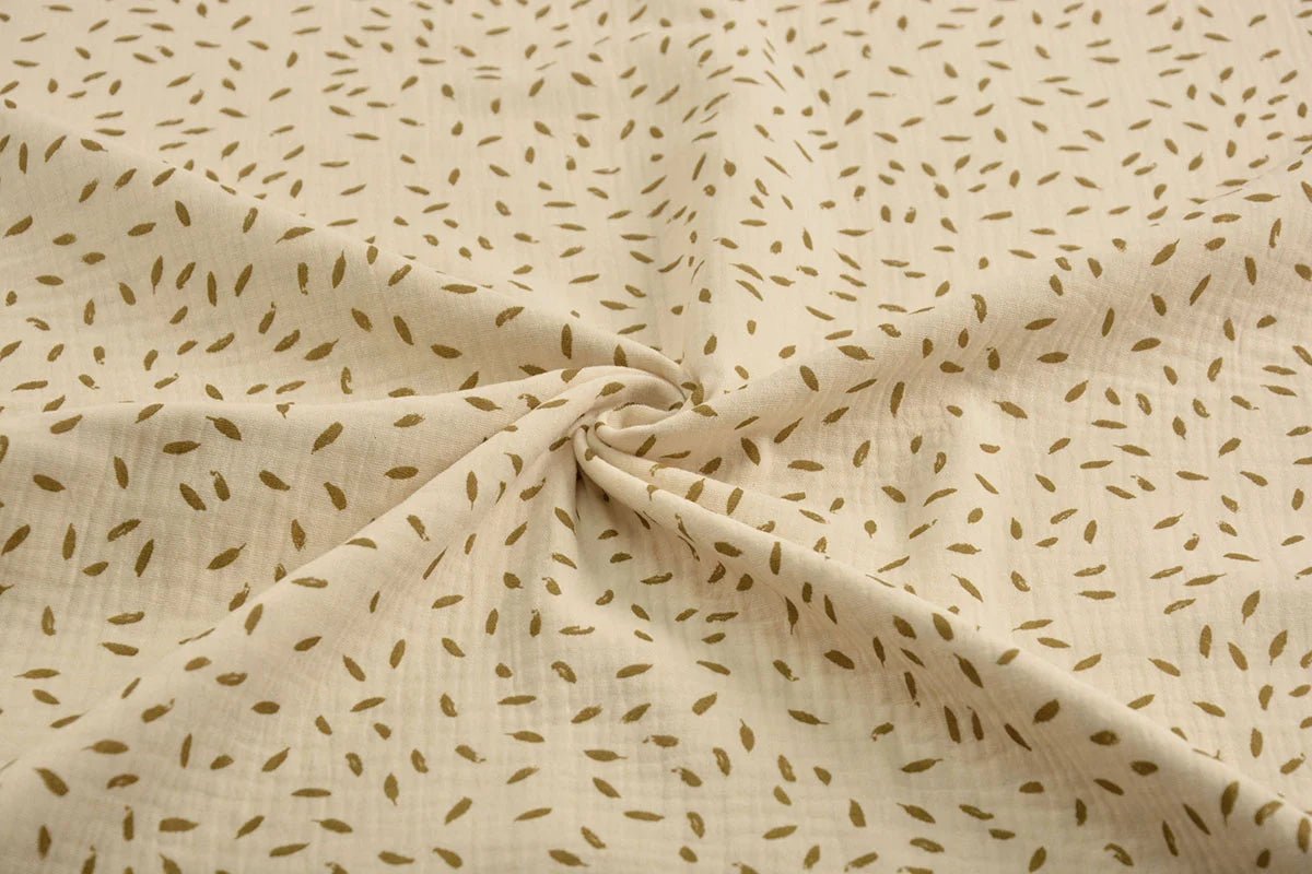 Motif petites feuilles en mousseline 125 g/m²
