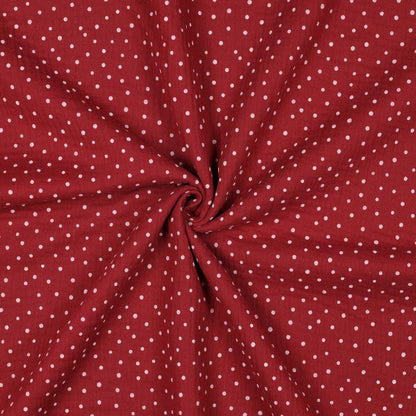 txt
Image de mousseline à pois sur fond rouge foncé 125 g/m² – disponible chez Šarlotes audumi