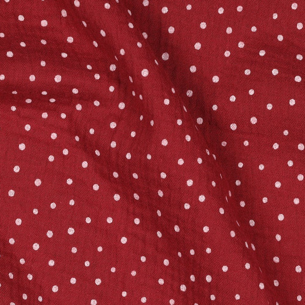 Image de mousseline à pois sur fond rouge foncé 125 g/m² – disponible chez Tissus Charlotte