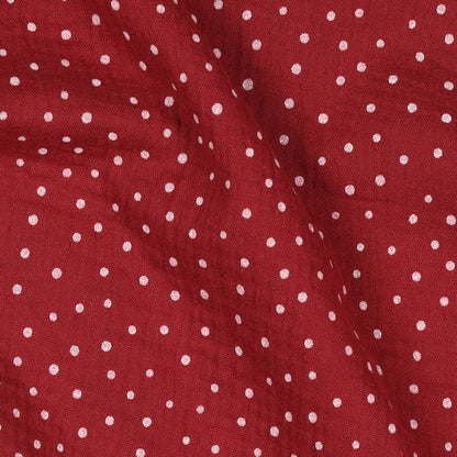 Image de mousseline à pois sur fond rouge foncé 125 g/m² – disponible chez Tissus Charlotte