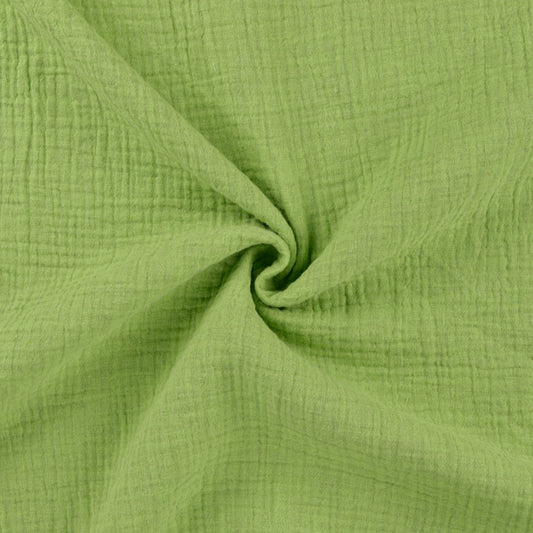 Image of green melange muslin – available online at Šarlotes audumi