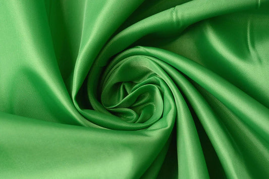 Image with lining fabric - apple green 55 g/m² – available at Charlotte's Fabrics