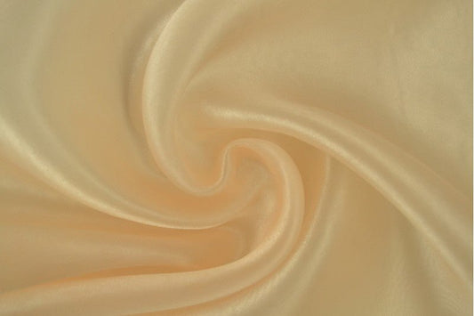 Organza - teinte pêche aérienne 25 g/m²