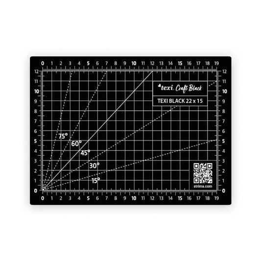 Image of a 22x15 cm black cutting mat – available at Šarlotes audumi