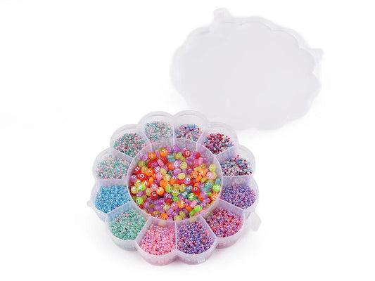 Image of a bead set in a flower-shaped box with nylon thread – available at Šarlotes audumi