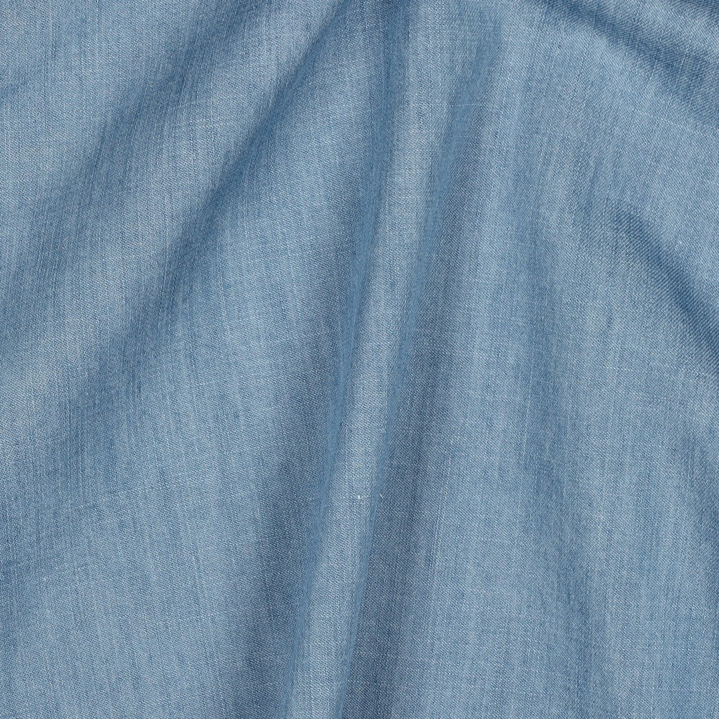 Image of thin denim fabric for dresses, shirts - light blue 135 g/m² – available at Šarlotes audumi