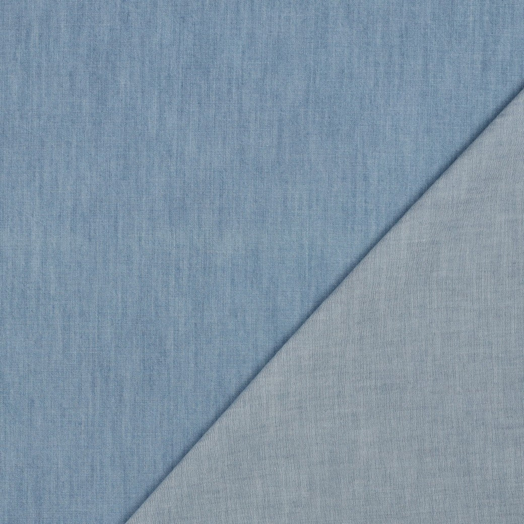 Image with light blue 135 g/m² plain denim fabric for dresses, shirts – available at Šarlotes audumi
