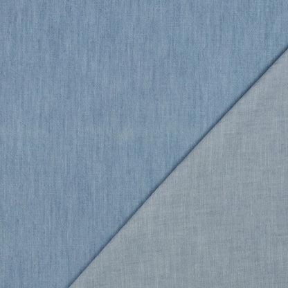 Image with light blue 135 g/m² plain denim fabric for dresses, shirts – available at Šarlotes audumi