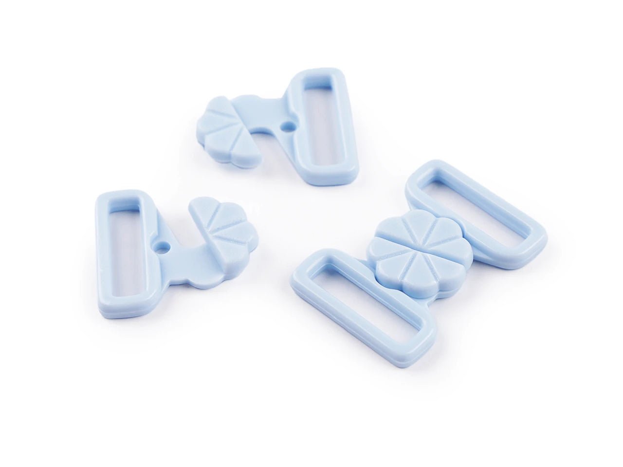 Image with plastic fasteners for swimwear– 17 mm 5 pairs – available at Šarlotes audumi