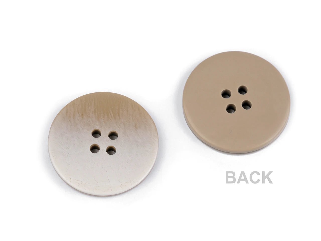 alt
Image with elegant ombre-effect buttons, a color-gradient design, Ø 21 mm - 28 mm – available at Charlotte's Fabrics