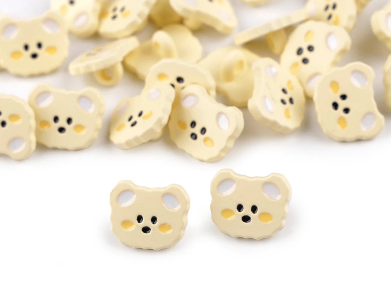 alt
Image with a button on a shank 15 mm kittens|various shades – available at Charlotte Fabrics
