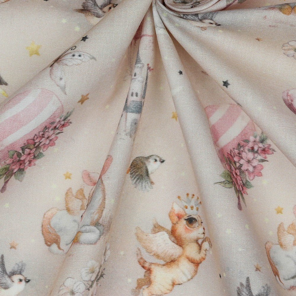 Tissu premium 100 % coton avec licornes sur fond rose pâle 105 g/m²