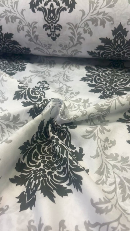 100 % Baumwollstoff – grau-schwarzes Muster 130 g/m²