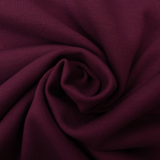 Image de tissu en maille Punta di Roma – bordeaux 320 g/m² – disponible chez Šarlotes audumi