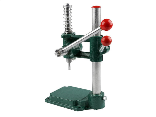 Image of a hand press for making buttons – available at Šarlotes audumi