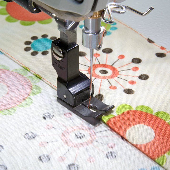 alt
Image of an industrial sewing machine presser foot - left compensating, 1.0 mm with PTFE coating – available at Charlotte's Fabrics