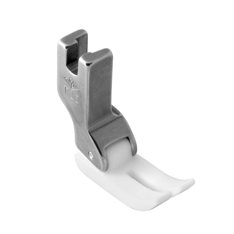 txt
Image d’une machine à coudre industrielle, pied-de-biche pour matériaux glissants en PTFE, téflon et cuir – disponible chez Šarlotes audumi