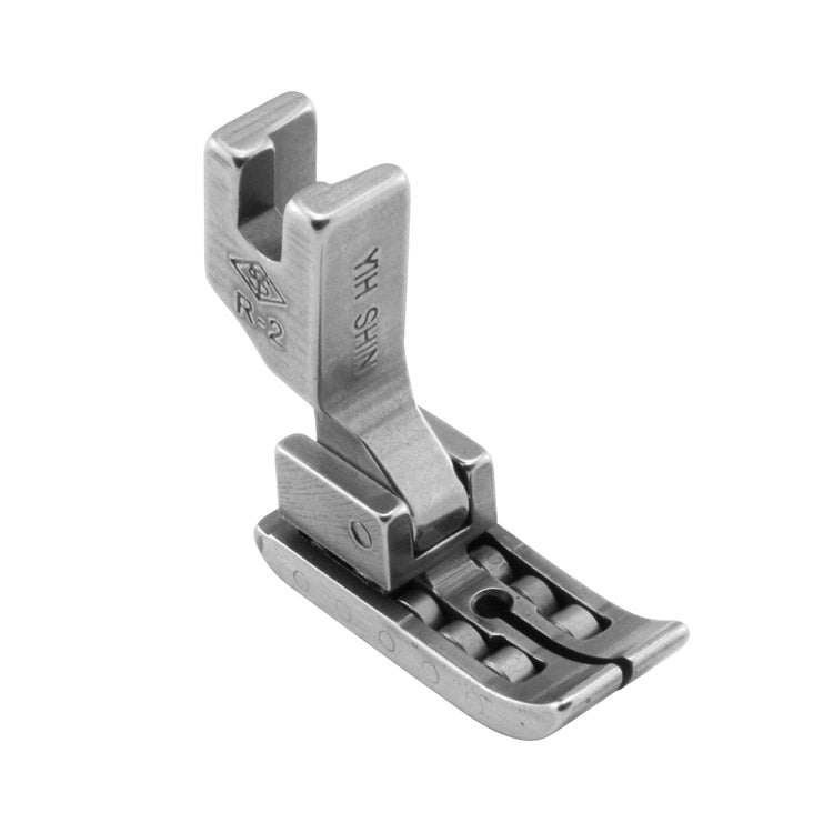 Image d’un pied-de-biche à rouleaux pour machine à coudre industrielle – disponible chez Les tissus de Charlotte