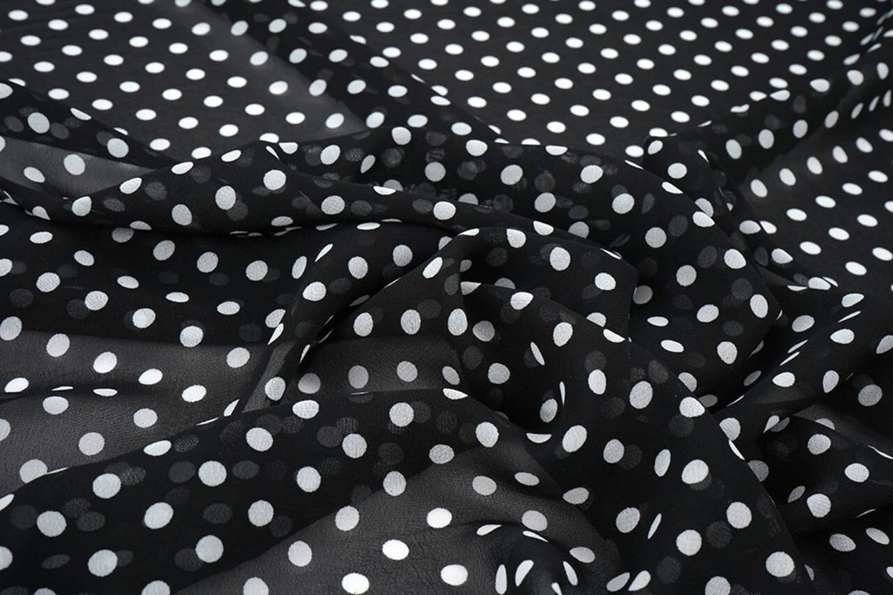 Chiffon à pois blancs sur fond noir | 150 cm | 65 g/m²