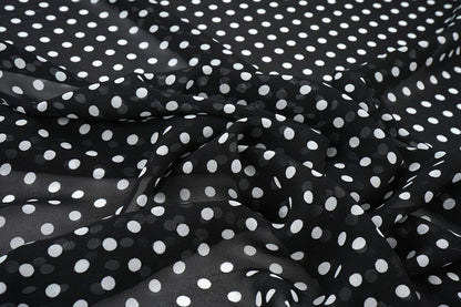 Chiffon à pois blancs sur fond noir | 150 cm | 65 g/m²