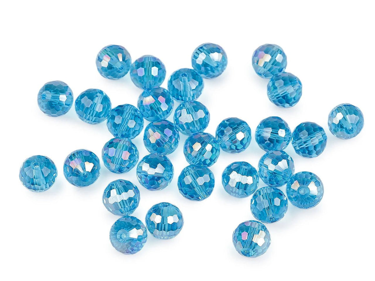 txt
Kuva hiotuista lasihelmistä AB-efektillä – 12 mm, 30 kpl – saatavilla verkossa Šarlotes audumi
