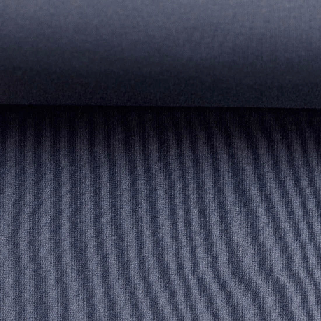 Image du tissu softshell - bleu jean fumé 300 g/m² – disponible chez Šarlotes audumi