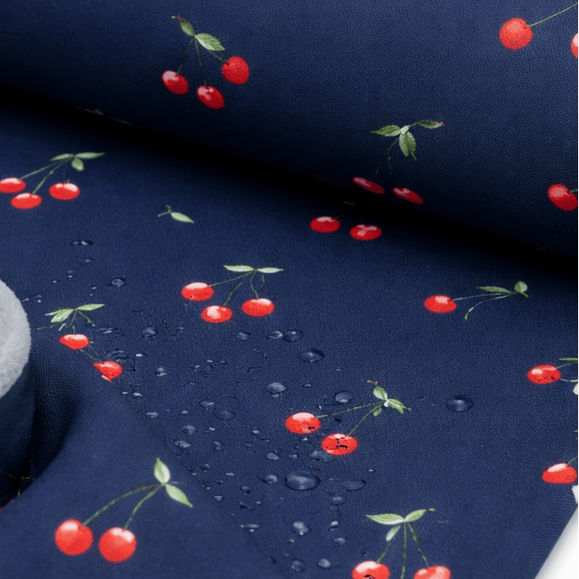 Image of Softshell fabric - cherries on dark blue 300 g/m² – available at Šarlotes audumi
