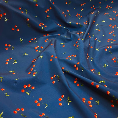 Image with Softshell fabric - cherries on dark blue 300 g/m² – available at Šarlotes audumi
