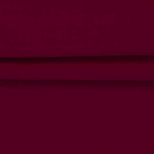 Softshell waterproof fabric in raspberry red – available online at Charlotte's Fabrics