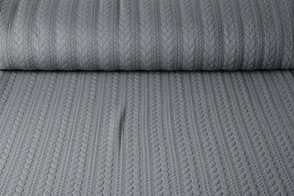 Attēls ar Trikotāžas audums ar adījuma rakstu - pelēkas pīnes 340 g/m² – pieejams Šarlotes audumi