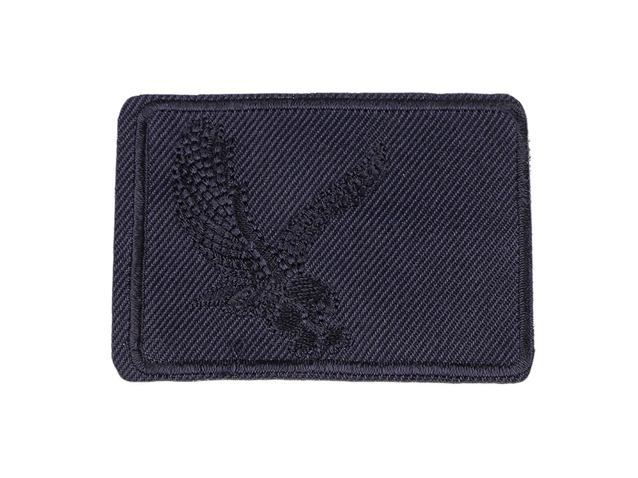 Image with iron-on patch with eagle|available in different shades – available at Charlotte Fabrics