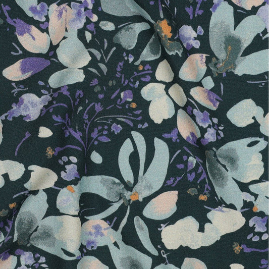 Image of viscose fabric with elastane, leaf motif on a petrol background, 135 g/m² – available at Šarlotes audumi
