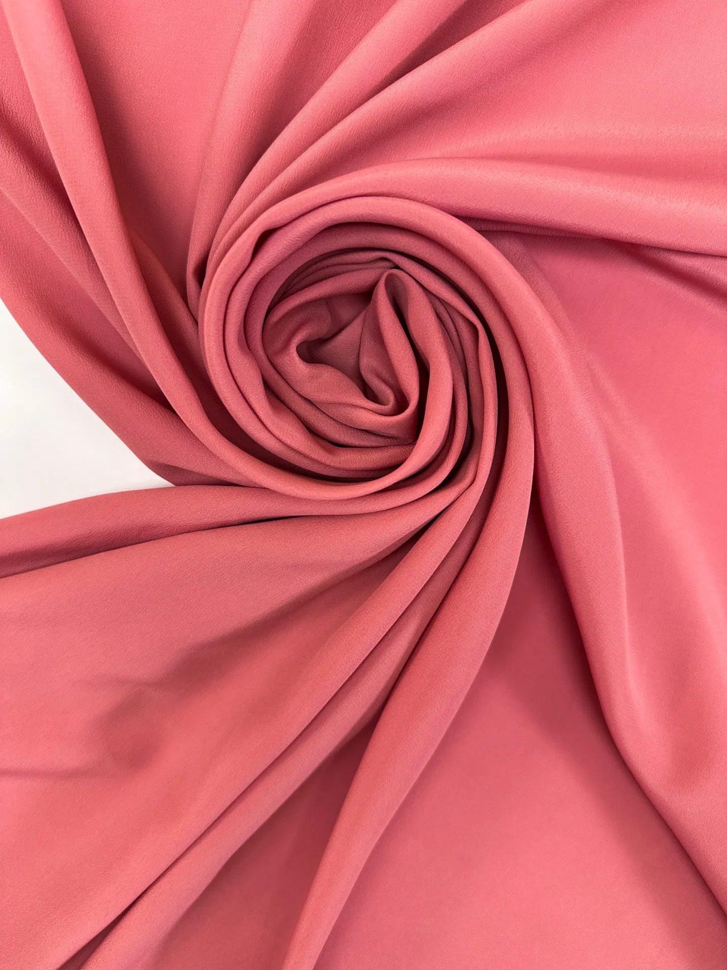 Tissu en soie - ton corail 75 g/m²