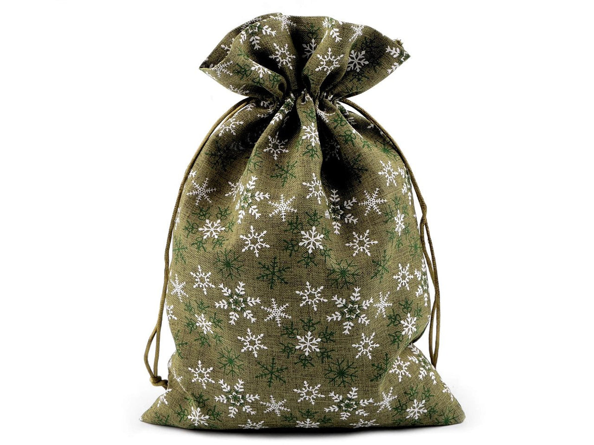 alt
Kuva joululahjapussista lumihiutalekuvioilla 20 × 30 cm – saatavilla verkossa Šarloten audat