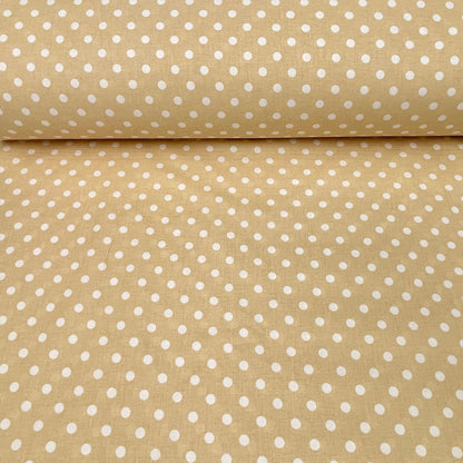 100% Baumwollstoff mit Pünktchen auf zartgelbem Hintergrund 125 g/m²