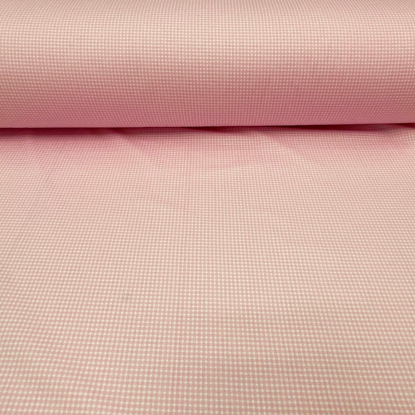 100 % puuvillakangas, hieno vaaleanpunaruudullinen 125 g/m²