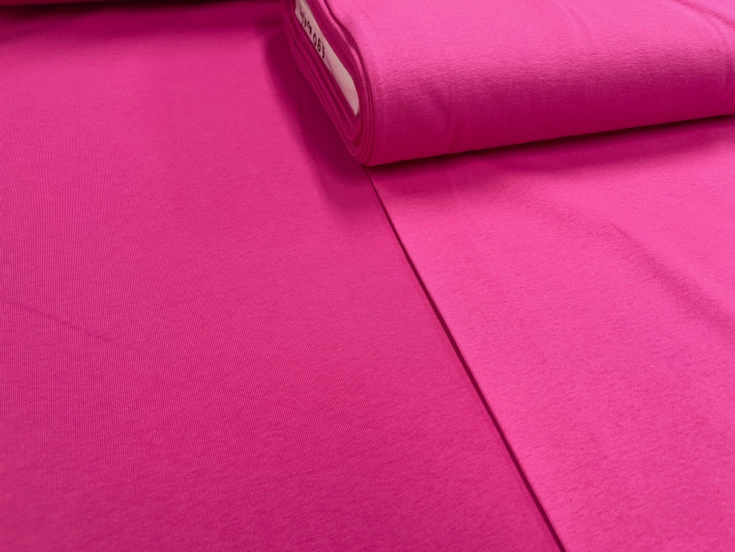 Tricot en coton molletonné-fuchsia 285 g/m²