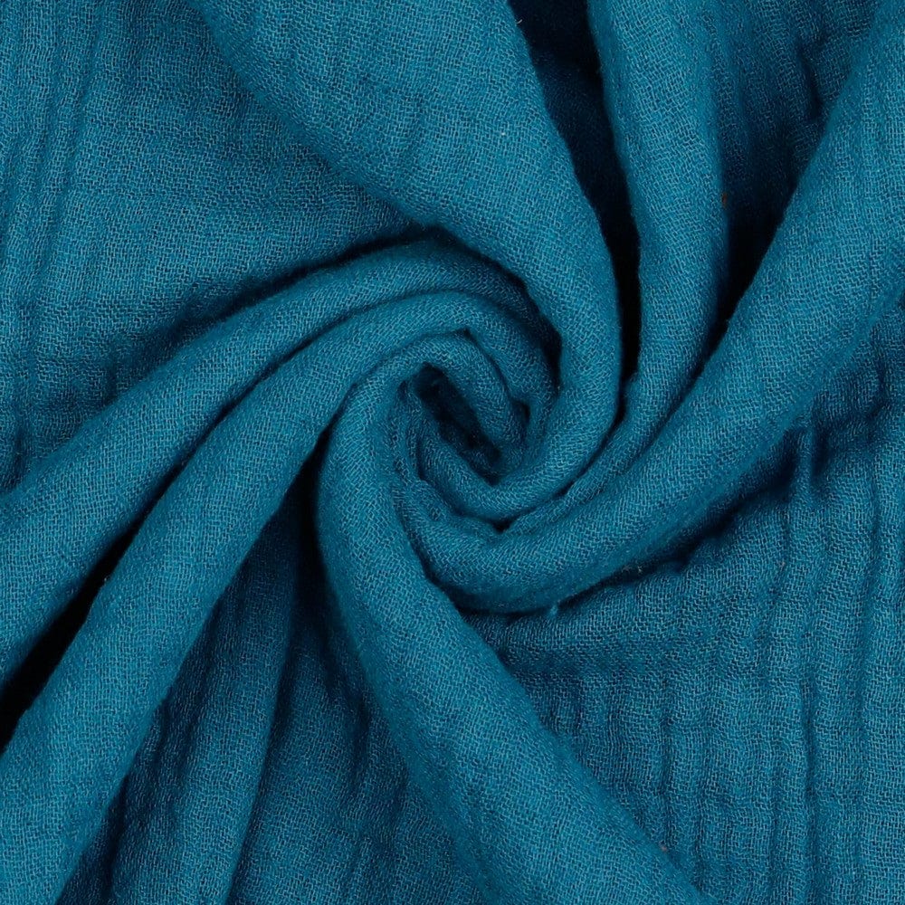 Mousseline bleu océan 125 g/m²