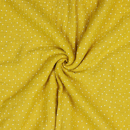 Pois en mousseline sur fond jaune miel 130 g/m²