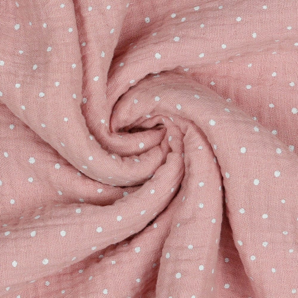 Musselin mit Pünktchen auf rosa Hintergrund 125 g/m²