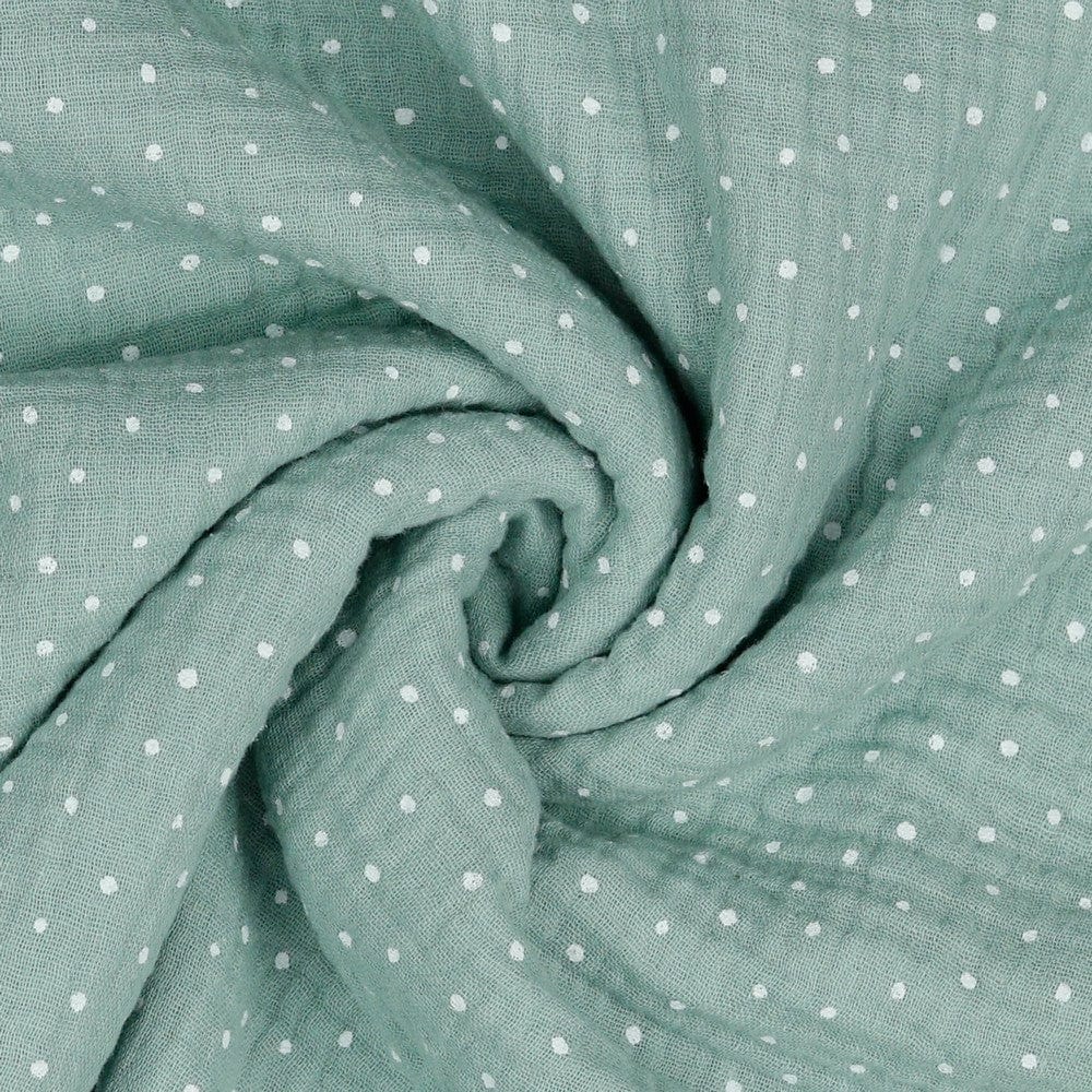 Mousseline à pois sur fond menthe foncé 125 g/m²