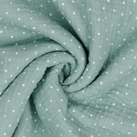 Mousseline à pois sur fond menthe foncé 125 g/m²