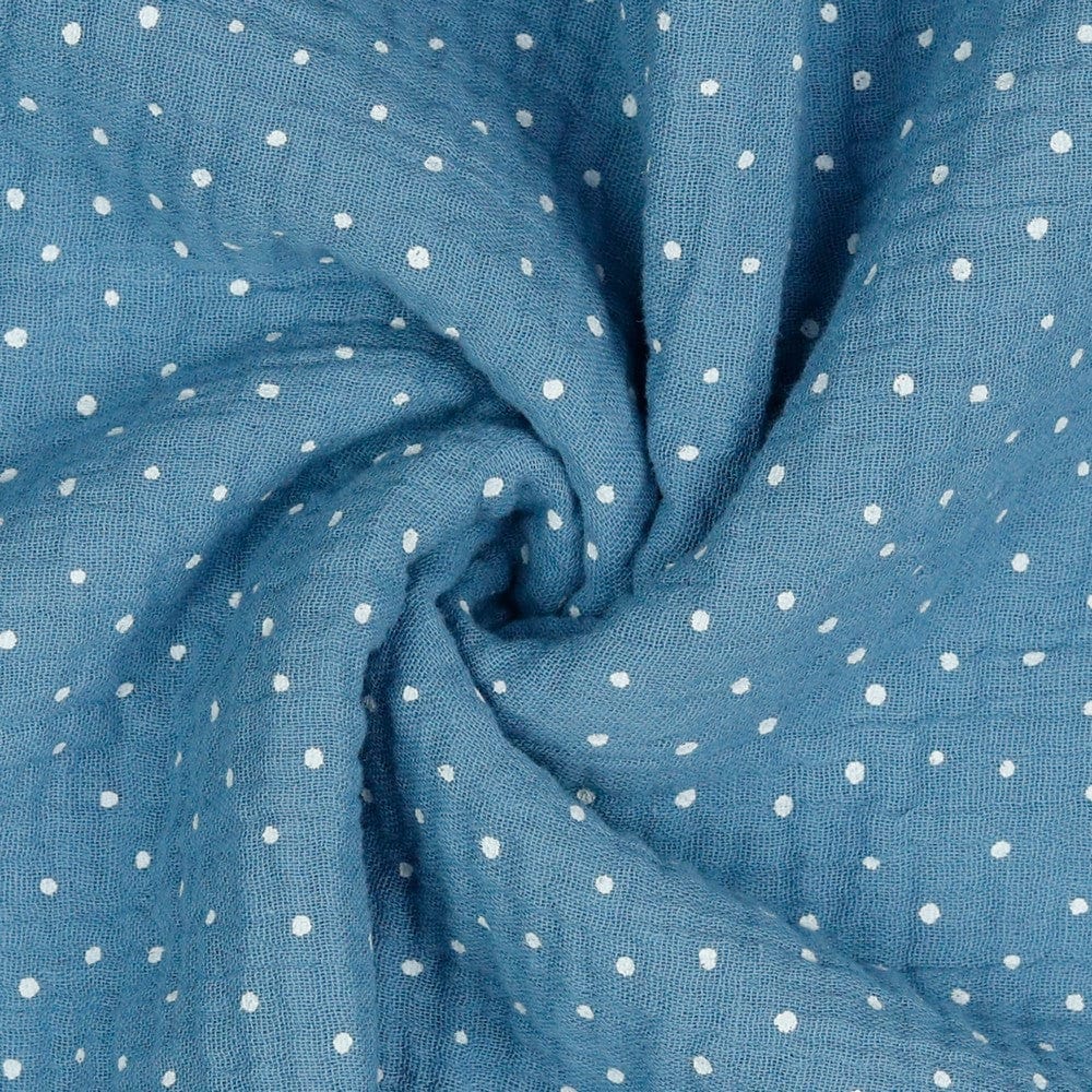 Mousseline à pois sur fond bleu 125 g/m²